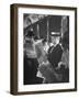 Commuters Sitting on a Train and Reading the Chicago Tribune-Charles E^ Steinheimer-Framed Photographic Print