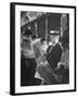 Commuters Sitting on a Train and Reading the Chicago Tribune-Charles E^ Steinheimer-Framed Photographic Print