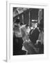 Commuters Sitting on a Train and Reading the Chicago Tribune-Charles E^ Steinheimer-Framed Photographic Print