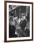 Commuters Sitting on a Train and Reading the Chicago Tribune-Charles E^ Steinheimer-Framed Photographic Print