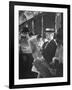 Commuters Sitting on a Train and Reading the Chicago Tribune-Charles E^ Steinheimer-Framed Photographic Print