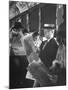 Commuters Sitting on a Train and Reading the Chicago Tribune-Charles E^ Steinheimer-Mounted Photographic Print