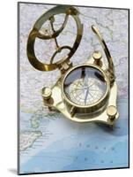 Compass on a Map-null-Mounted Photographic Print