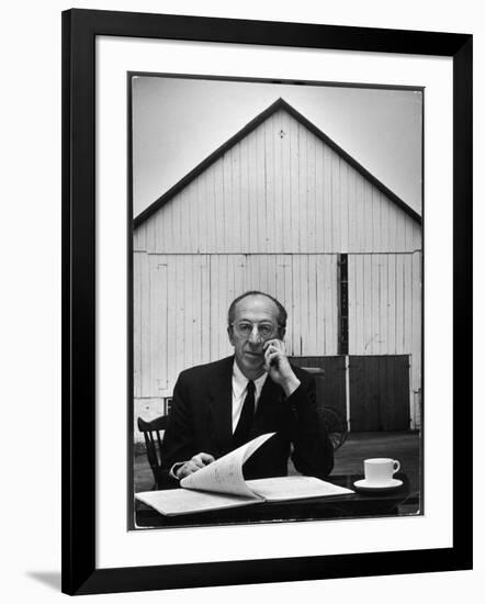 Composer Arron Copland Sitting at Table with Score in Front of Barn-Gordon Parks-Framed Photographic Print