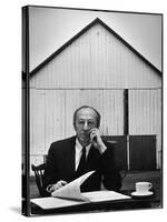 Composer Arron Copland Sitting at Table with Score in Front of Barn-Gordon Parks-Stretched Canvas