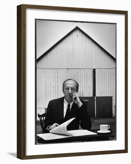 Composer Arron Copland Sitting at Table with Score in Front of Barn-Gordon Parks-Framed Photographic Print