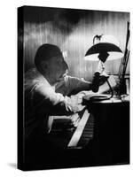 Composer Igor Stravinsky Working at a Piano in an Empty Dance Hall in Venice-Gjon Mili-Stretched Canvas