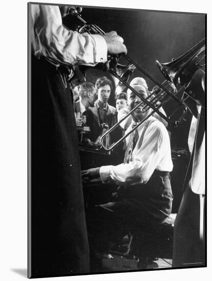 Composer Pianist Duke Ellington Playing Piano Amidst Two Trombonists during After Hours Jam Session-Gjon Mili-Mounted Premium Photographic Print
