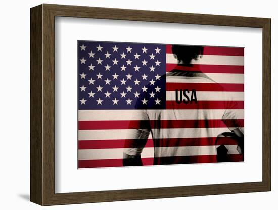 Composite Image of Usa Football Player Holding Ball against Usa National Flag-Wavebreak Media Ltd-Framed Photographic Print
