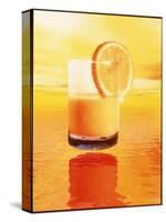 Computer Art of Glass of Orange Juice & Orange Sea-Victor Habbick-Stretched Canvas