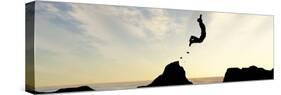 Concept or Conceptual Young Man or Businessman Silhouette Jump Happy from Cliff over Water Gap Suns-bestdesign36-Stretched Canvas