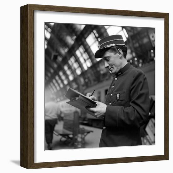 Conductor on the Orient Express Train Making Notes on a Piece of Paper, June 1950-Jack Birns-Framed Photographic Print