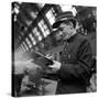 Conductor on the Orient Express Train Making Notes on a Piece of Paper, June 1950-Jack Birns-Stretched Canvas