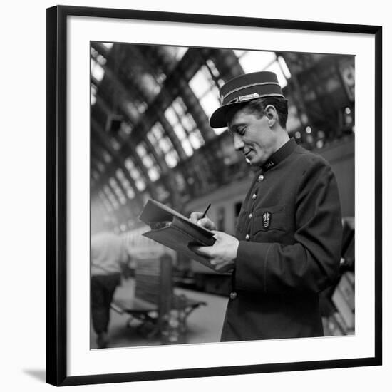 Conductor on the Orient Express Train Making Notes on a Piece of Paper, June 1950-Jack Birns-Framed Photographic Print