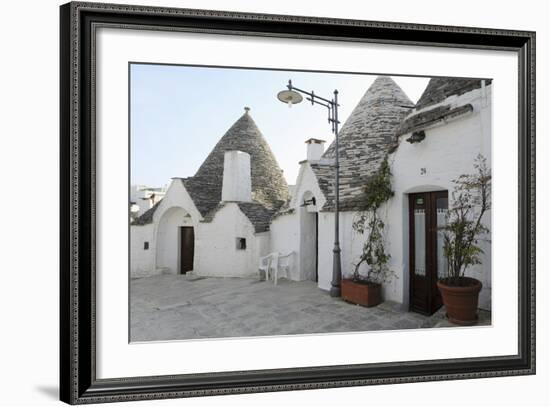 Cone-Shaped Trulli Houses, in the Rione Monte District of Alberobello, in Apulia, Italy-Stuart Forster-Framed Photographic Print