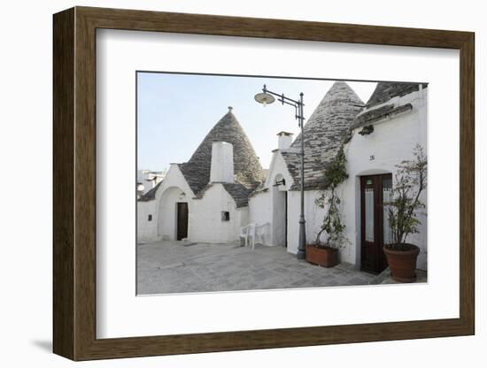 Cone-Shaped Trulli Houses, in the Rione Monte District of Alberobello, in Apulia, Italy-Stuart Forster-Framed Photographic Print