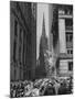 Confetti and Streamers Fly Down from Office Buildings, People Celebrating End of the War in Europe-Andreas Feininger-Mounted Photographic Print