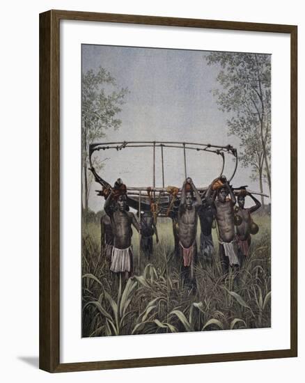 Congo Native Carrying Part of Steamboat Faidherbe Through Savannah Between Congo and Nile-null-Framed Giclee Print