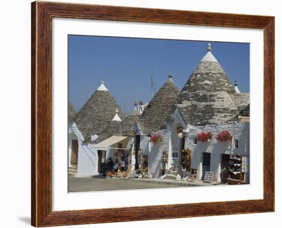 Conical Roofs and Whitewashed Walls of Trullis in Alberobello, Puglia, Italy-Hans Peter Merten-Framed Photographic Print