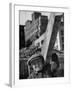 Construction Worker Carrying a Piece of Wood-Cornell Capa-Framed Photographic Print