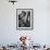 Construction Worker Carrying a Piece of Wood-Cornell Capa-Framed Photographic Print displayed on a wall