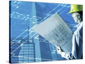 Construction Worker Reviewing a Drafting Plan-null-Stretched Canvas