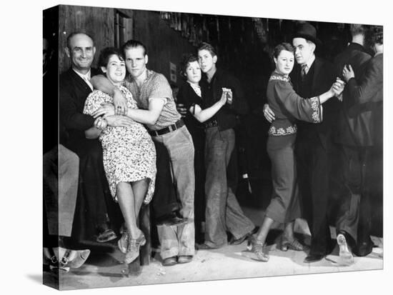 Construction Workers and Taxi Dancers Enjoying a Night Out in Barroom in Frontier Town-Margaret Bourke-White-Stretched Canvas
