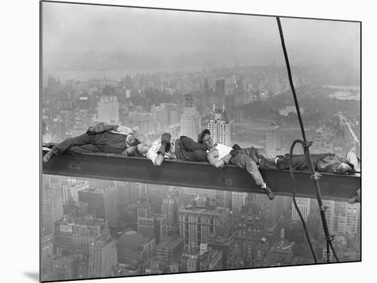 Construction Workers Resting on Steel Beam Above Manhattan, 1932-null-Mounted Art Print
