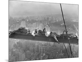 Construction Workers Resting on Steel Beam Above Manhattan, 1932-null-Mounted Art Print