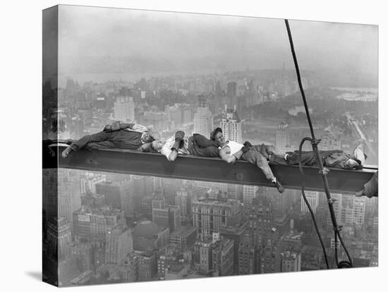 Construction Workers Resting on Steel Beam above Manhattan-null-Stretched Canvas