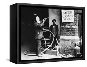 Construction Workers Spraying Cement on Roof with Concrete Gun-null-Framed Stretched Canvas