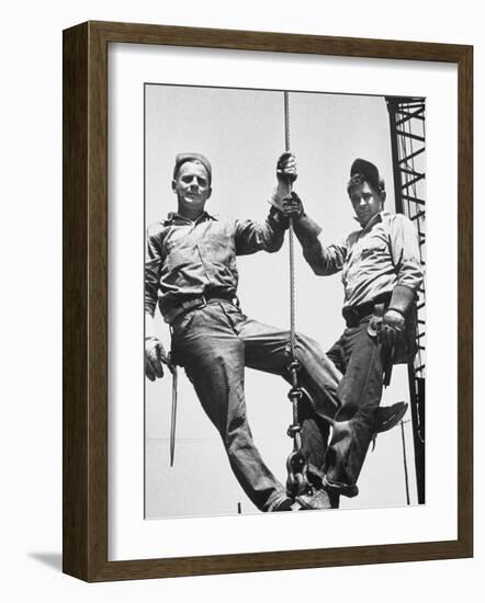 Construction Workers Standing on a Wreaking Ball-Ralph Crane-Framed Photographic Print