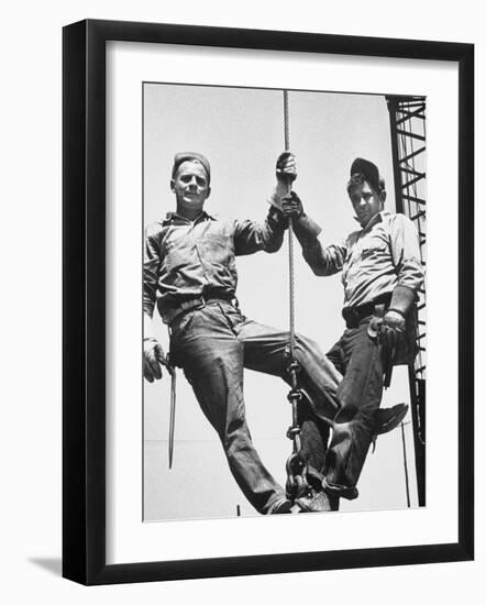 Construction Workers Standing on a Wreaking Ball-Ralph Crane-Framed Photographic Print