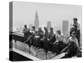 Construction Workers Take a Lunch Break on a Steel Beam Atop the RCA Building at Rockefeller Center-null-Stretched Canvas