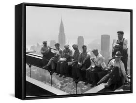 Construction Workers Take a Lunch Break on a Steel Beam Atop the RCA Building at Rockefeller Center-null-Framed Stretched Canvas