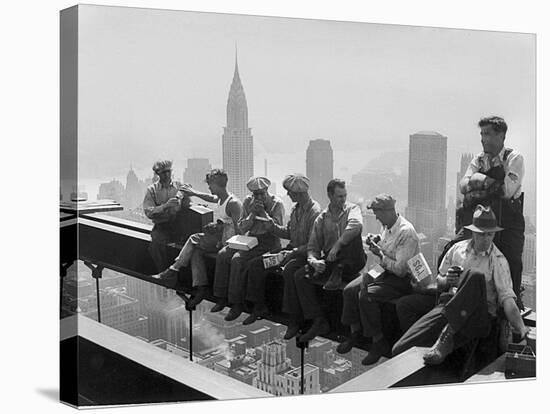 Construction Workers Take a Lunch Break on a Steel Beam Atop the RCA Building at Rockefeller Center-null-Stretched Canvas
