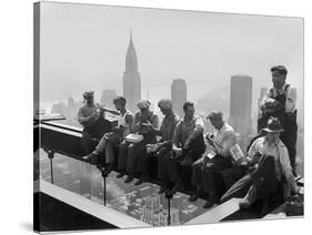 Construction Workers Take a Lunch Break on a Steel Beam Atop the RCA Building at Rockefeller Center-null-Stretched Canvas