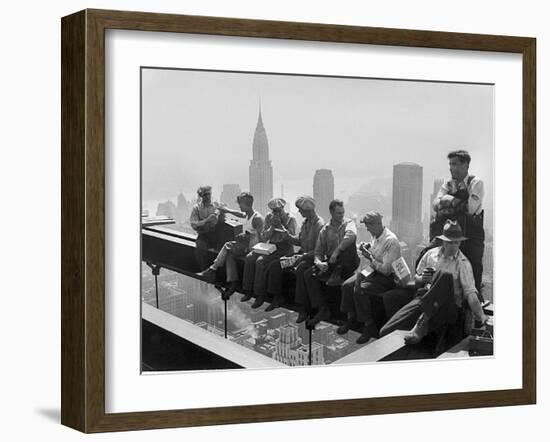 Construction Workers Take a Lunch Break on a Steel Beam Atop the RCA Building at Rockefeller Center-null-Framed Premium Photographic Print