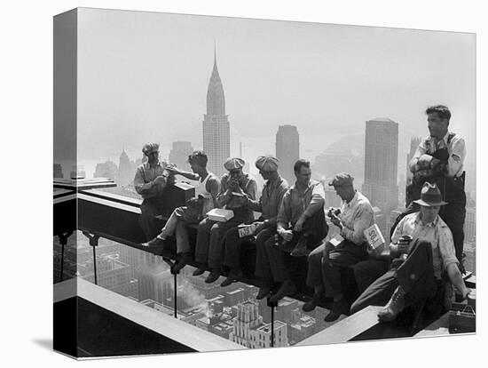 Construction Workers Take a Lunch Break on a Steel Beam Atop the RCA Building at Rockefeller Center-null-Stretched Canvas