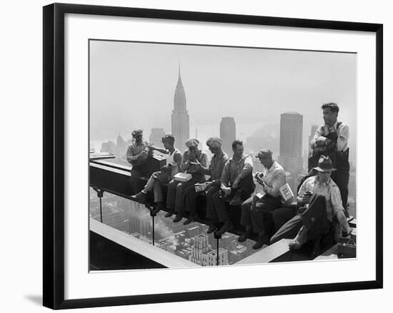 Construction Workers Take a Lunch Break on a Steel Beam Atop the RCA Building at Rockefeller Center-null-Framed Photographic Print