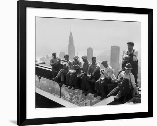 Construction Workers Take a Lunch Break on a Steel Beam Atop the RCA Building at Rockefeller Center-null-Framed Photographic Print