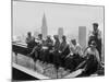Construction Workers Take a Lunch Break on a Steel Beam Atop the RCA Building at Rockefeller Center-null-Mounted Photographic Print