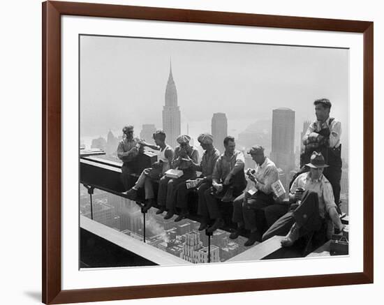 Construction Workers Take a Lunch Break on a Steel Beam Atop the RCA Building at Rockefeller Center-null-Framed Photographic Print