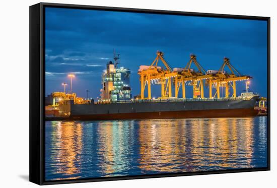 Container Cargo Freight Ship with Working Container Crane in Shipyard at Dusk-Prasit Rodphan-Framed Stretched Canvas