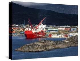 Container Ship Unloading at Nanortalik Port, Island of Qoornoq, Kitaa, Southern Greenland-Richard Cummins-Stretched Canvas