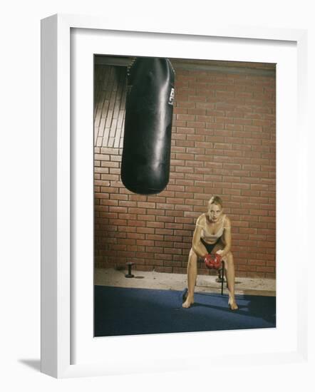 Contemplating the Bag-null-Framed Photographic Print