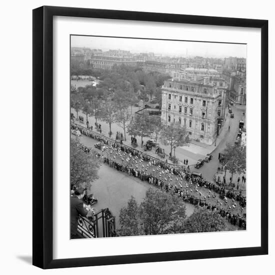 Contestants in the 1948 Tour De France Parade up the Champs Elysees-null-Framed Premium Photographic Print