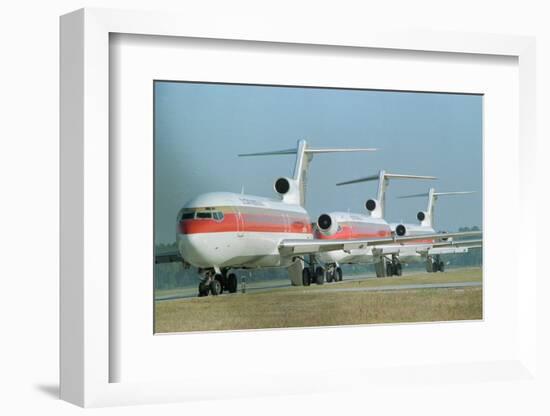 Continental Airplanes on Runway-null-Framed Photographic Print