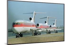 Continental Airplanes on Runway-null-Mounted Photographic Print