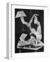 Contortionist Assembling a Dymaxion Map-Wallace Kirkland-Framed Photographic Print